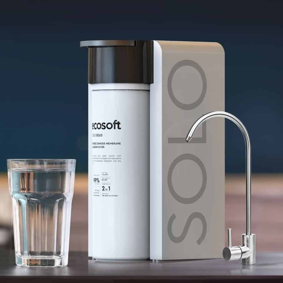Filtered water purification system with EcoSoft carbon filter and sleek faucet design for clean, healthy drinking water. Perfect for home use, providing high-quality filtered water with advanced filtration technology.
